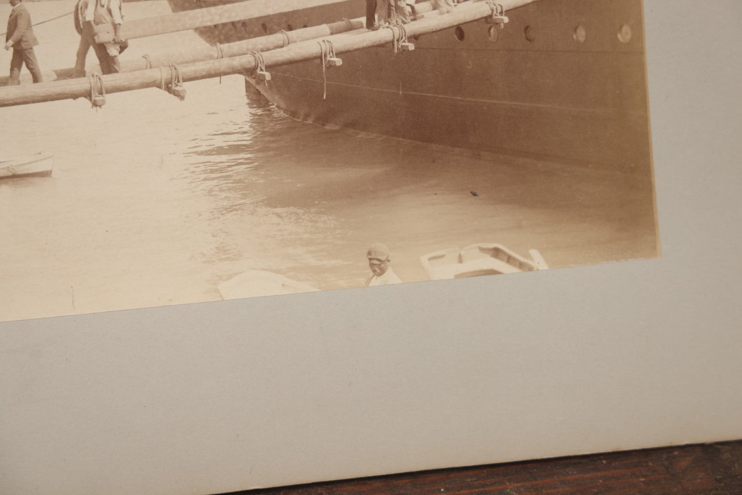 Lot 070 - Antique Boarded Photograph Of A Ship At Port, Bermuda, With Passengers And Workers Visible
