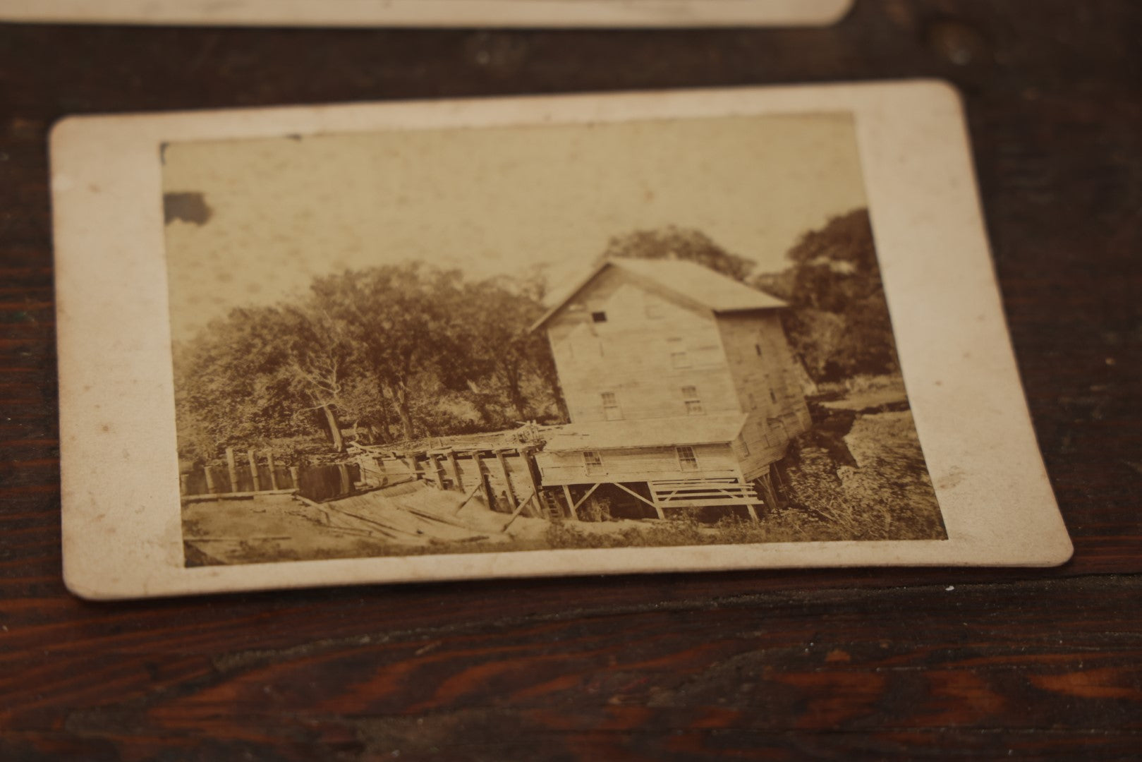 Lot 077 - Grouping Of Antique Boarded And Cabinet Card Photographs, Flooded House With People On Canoe, Old Factory Or Mill, And Stereo View Of Riverside