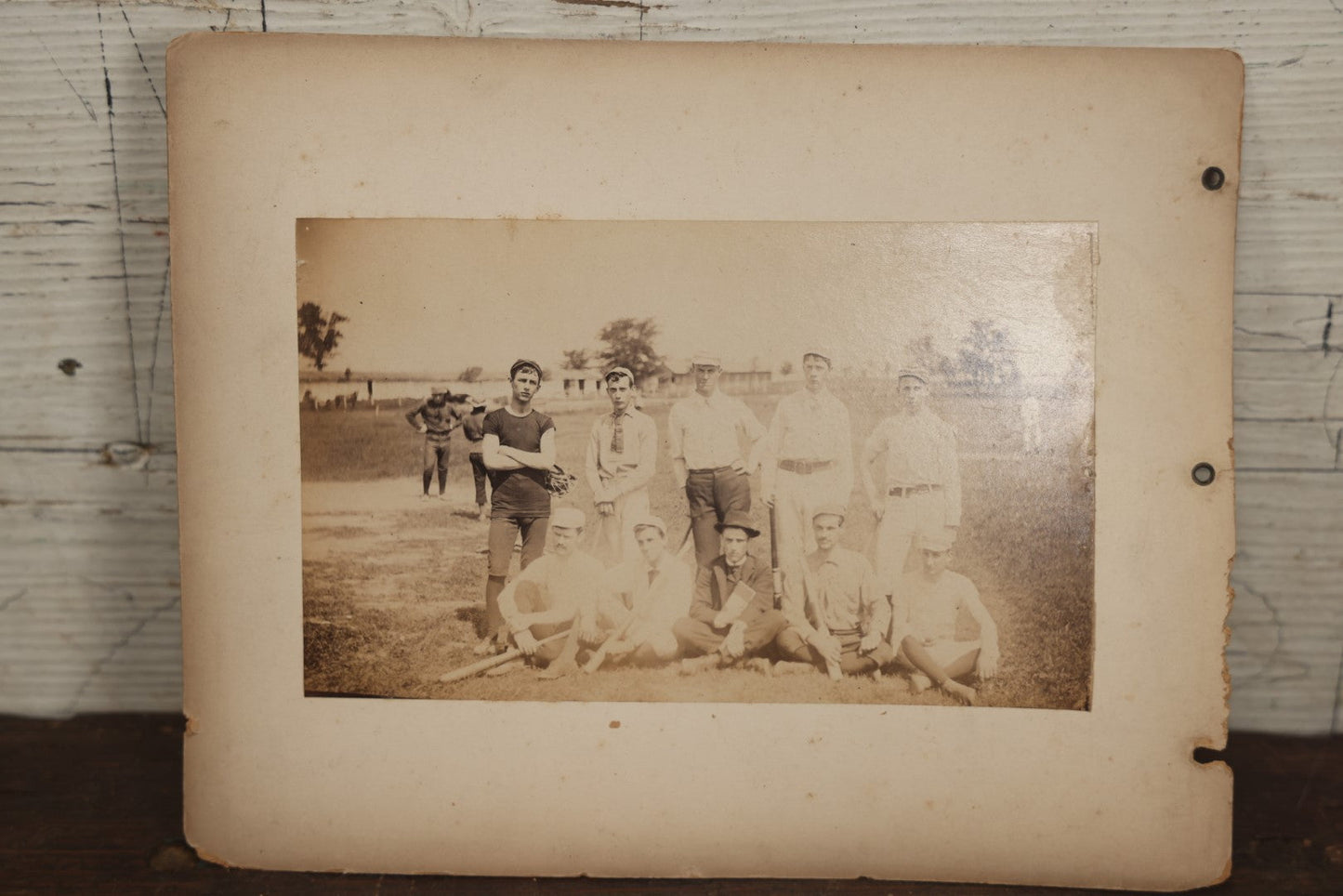 Lot 007 - Pair Of Early Antique Baseball Team Group Mounted Photographs, From A Photo Album, Note Pitcher In Background, Early Uniforms And Gear, Circa Late 1880s, Other Photos On Back, Approx 7-1/2" x 4-1/2" Actual Photo Dimensions