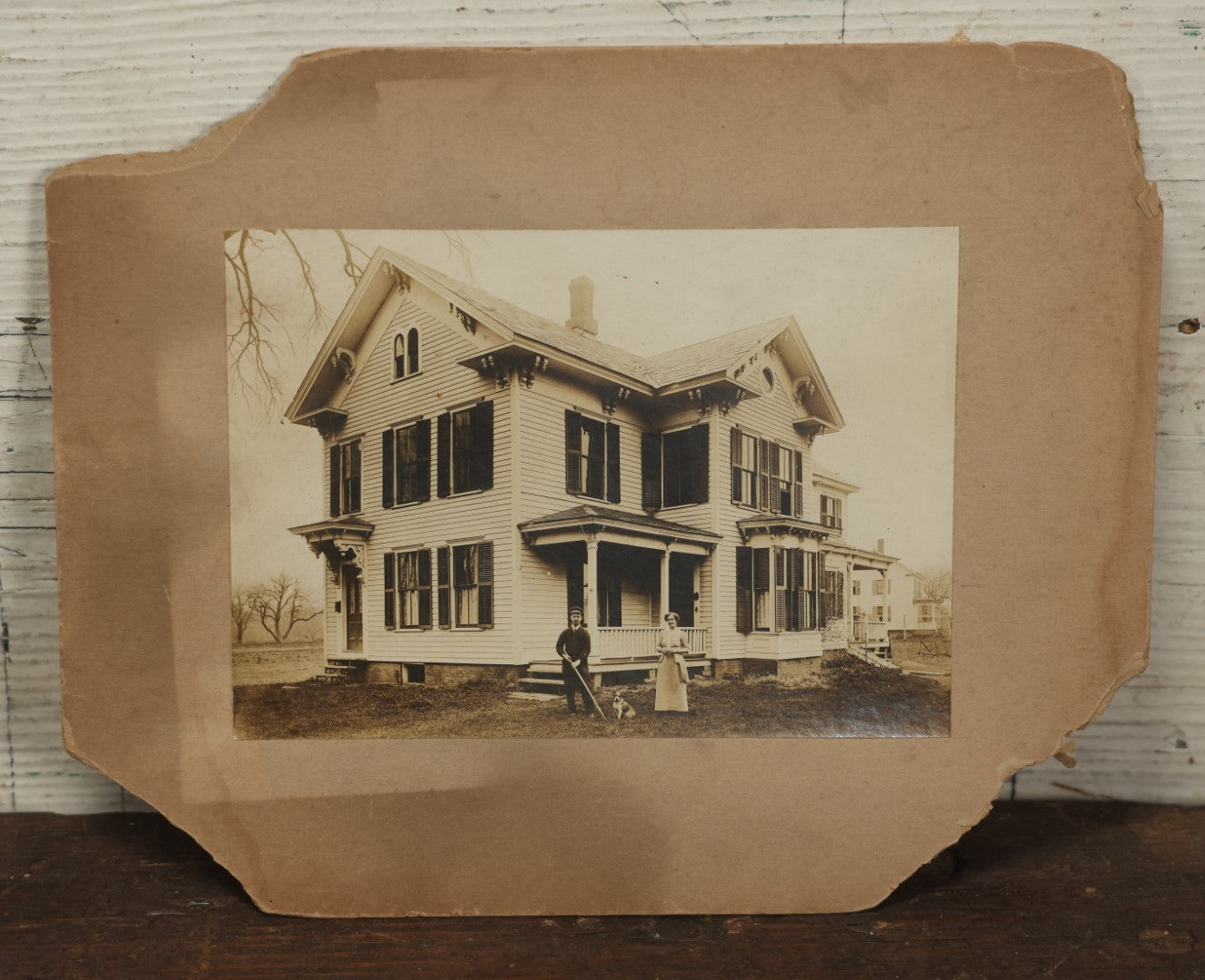 Lot 134 - Antique Boarded Photo Of A Man, Woman, And Their Little Dog Outside Their House, Note Losses To Board