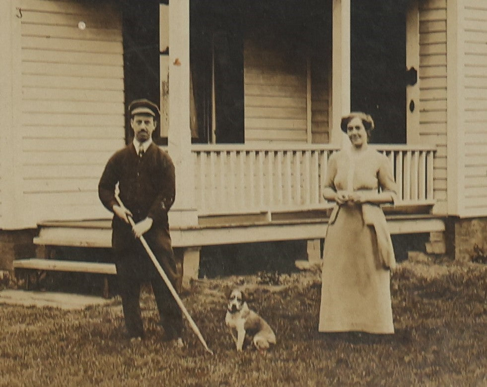 Lot 134 - Antique Boarded Photo Of A Man, Woman, And Their Little Dog Outside Their House, Note Losses To Board