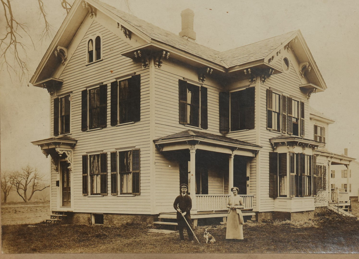 Lot 134 - Antique Boarded Photo Of A Man, Woman, And Their Little Dog Outside Their House, Note Losses To Board