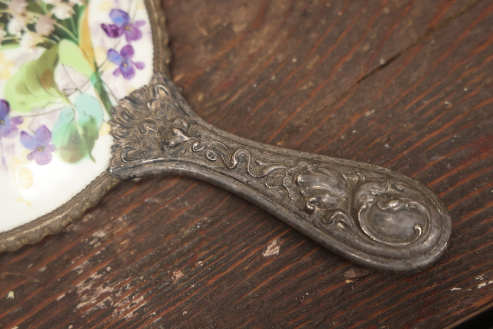 Lot 028 - Antique Silverplate Handle Hand Held Dresser Mirror With Hand Painted Porcelain Backing, Note Mirror Worn, Not Usable, Needs Replaced