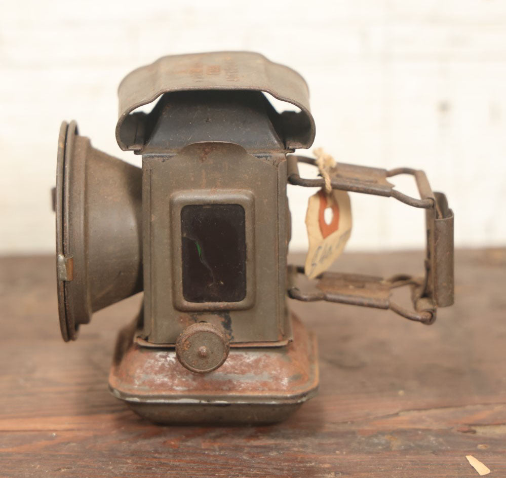 Lot 030 - Antique Kerosene Bicycle Lamp With Clear, Red, And Green Glass Lenses, By Argonaut, Made In U.S.A., Note Crack In Red Glass 