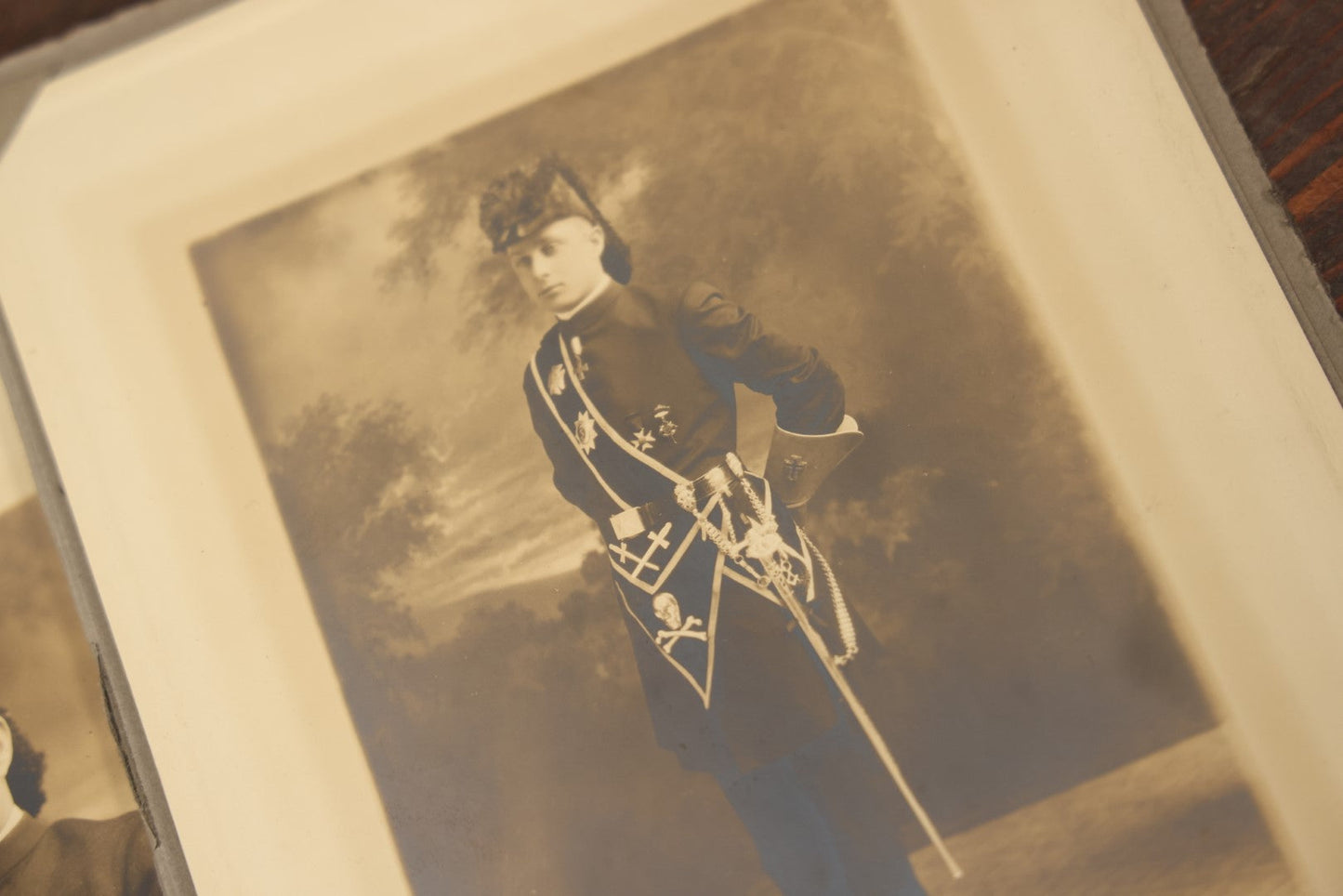 Lot 042 - Grouping Of Four Antique Foldered Portrait Photos Of A Young Knights Templar / Freemasons Member, "Dan," In Uniform With Skull And Crossbones Apron, From Gardner Artist Studio, Gardner, Massachusetts