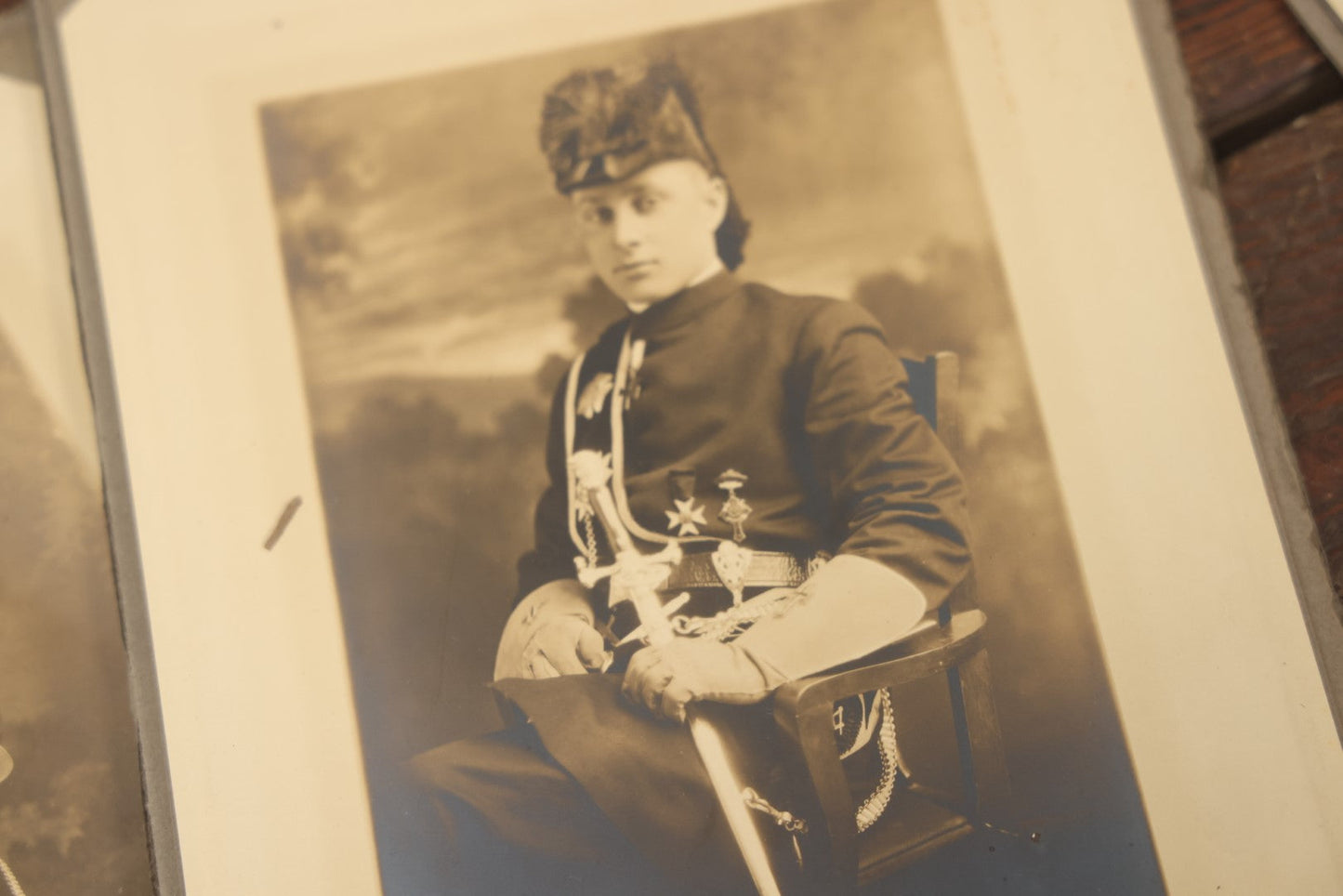 Lot 042 - Grouping Of Four Antique Foldered Portrait Photos Of A Young Knights Templar / Freemasons Member, "Dan," In Uniform With Skull And Crossbones Apron, From Gardner Artist Studio, Gardner, Massachusetts