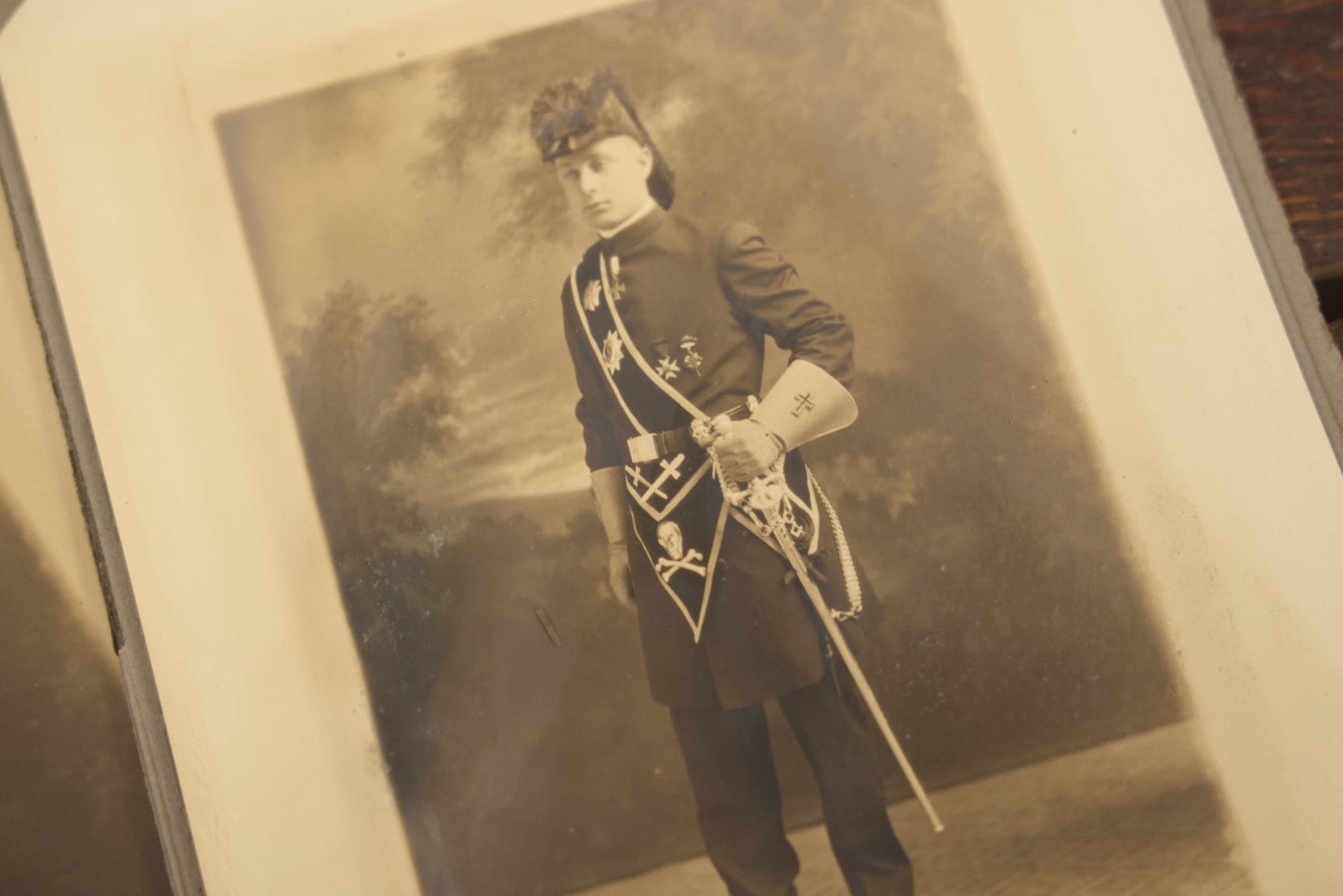 Lot 042 - Grouping Of Four Antique Foldered Portrait Photos Of A Young Knights Templar / Freemasons Member, "Dan," In Uniform With Skull And Crossbones Apron, From Gardner Artist Studio, Gardner, Massachusetts