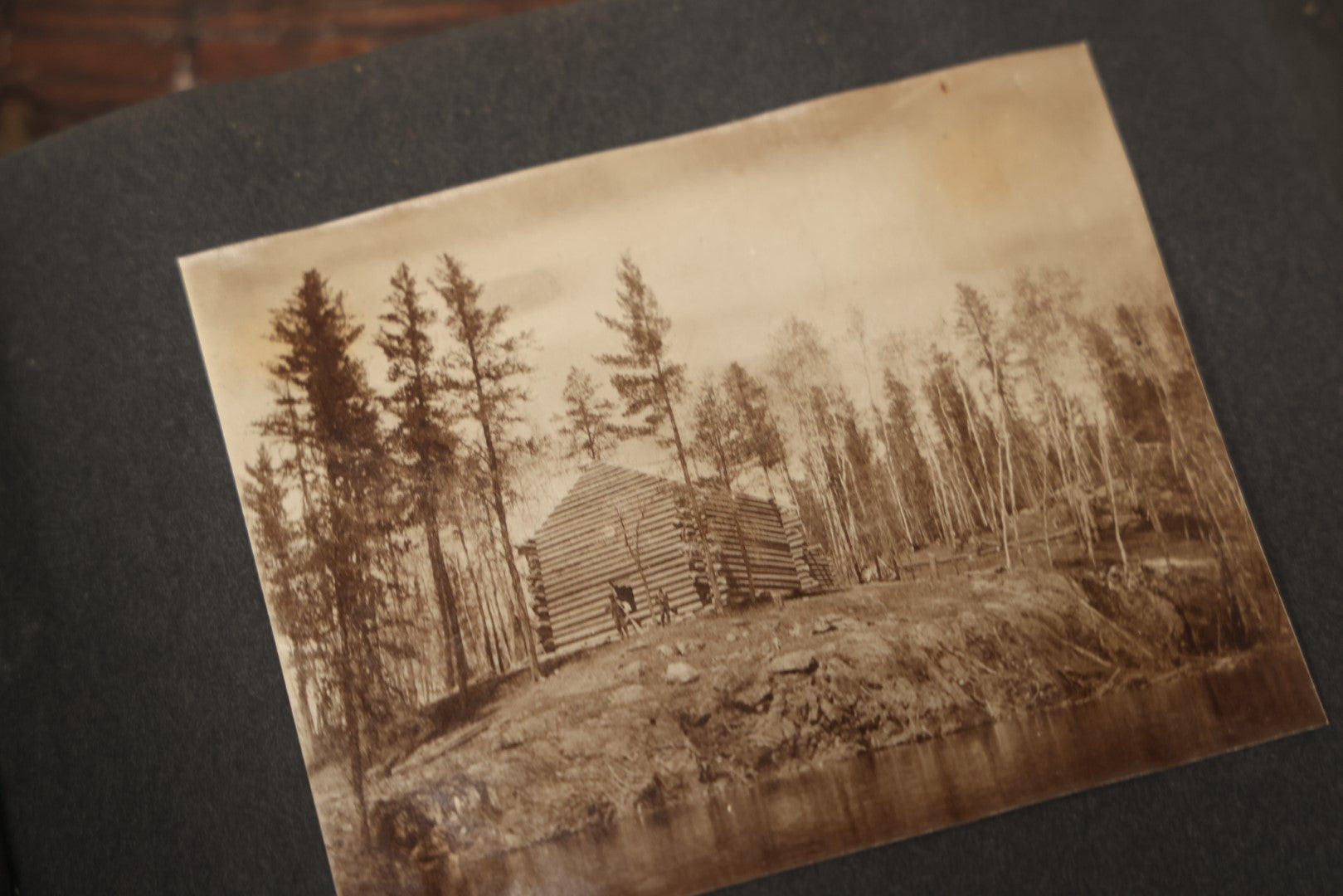 Lot 043 - Antique Early 20th Century Snap Shot Photo Album Chronicling The Lives And Adventures Of Outdoorsmen, Canoeing, Camping, Hunting, Snow Shoeing, Winter Scenes, Note Wear And Soft Focus