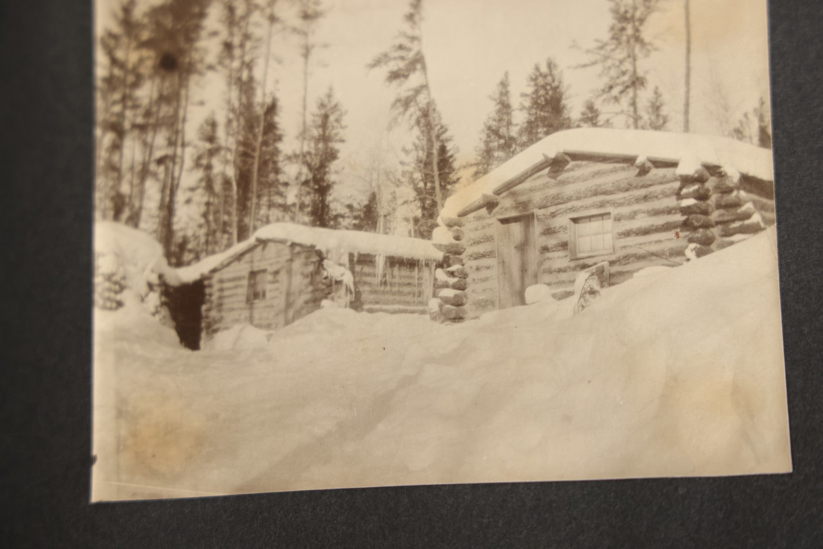 Lot 043 - Antique Early 20th Century Snap Shot Photo Album Chronicling The Lives And Adventures Of Outdoorsmen, Canoeing, Camping, Hunting, Snow Shoeing, Winter Scenes, Note Wear And Soft Focus