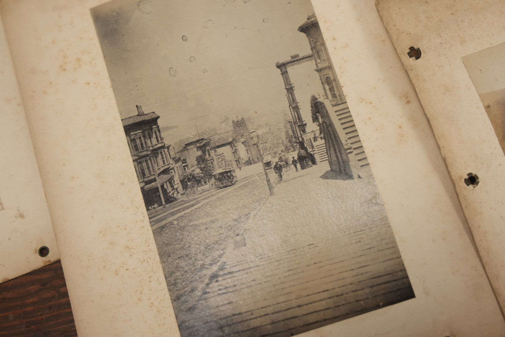 Lot 046 - Grouping Of 10+ Antique Boarded Photographs (Two Photos Per Each, Double Sided) Featuring Landscapes, Buildings, Possible Early Photo Of San Francisco Street, Etc., Circa 1880s