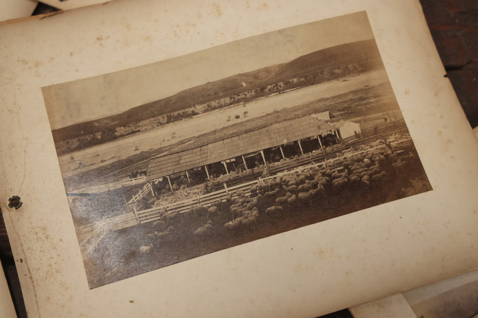 Lot 046 - Grouping Of 10+ Antique Boarded Photographs (Two Photos Per Each, Double Sided) Featuring Landscapes, Buildings, Possible Early Photo Of San Francisco Street, Etc., Circa 1880s