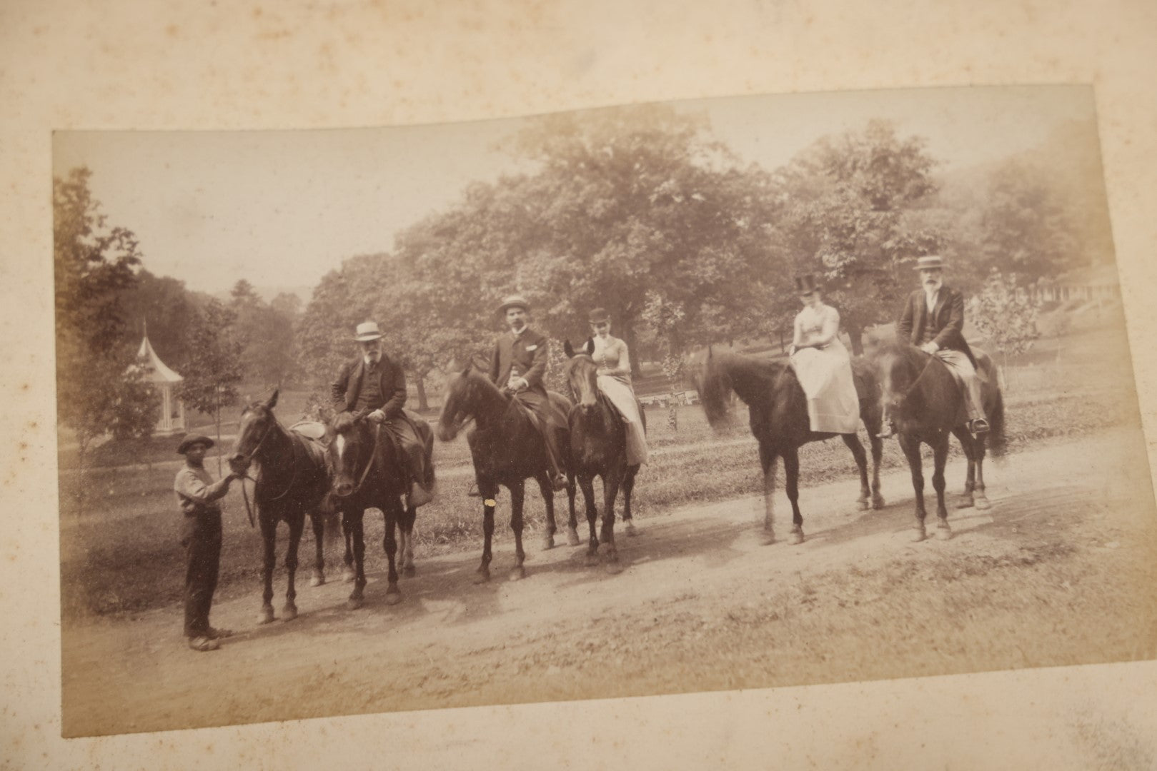 Lot 047 - Grouping Of 9+ Antique Boarded Photographs (Two Photos Per Each, Double Sided) Featuring People On Horseback, Couple Sleeping On Porch, Various Group Nature Photos, Circa 1880s