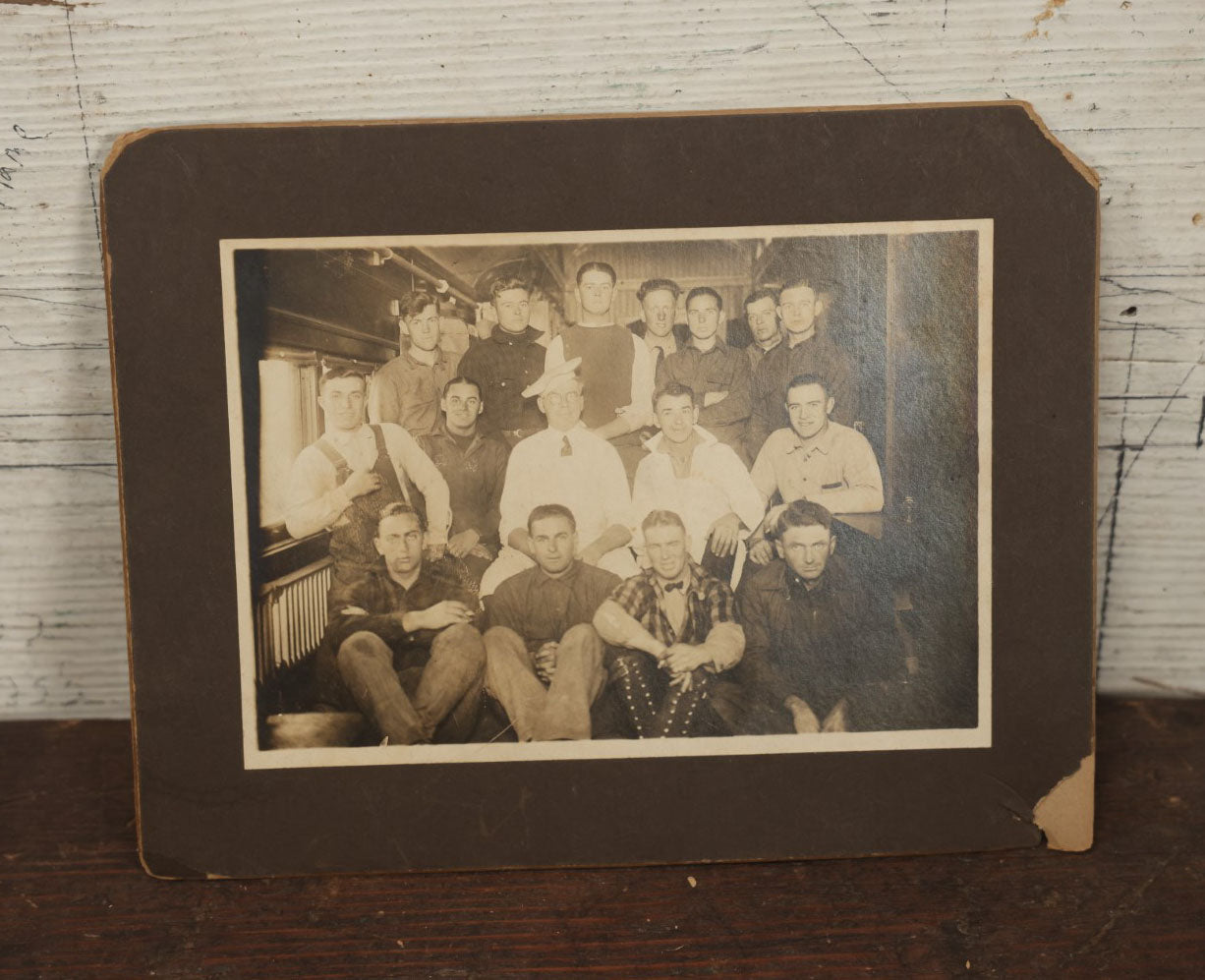 Lot 050 - Antique Boarded Group Photograph Of Interesting, Tough Looking Men, Young Men With Older Man, Appears To Be Taken On A Train