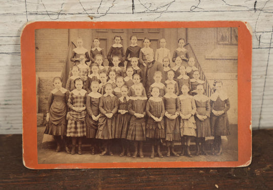 Lot 053 - Antique Cabinet Card Photograph Of An All Girls School Class, Outside Building, With Adult Man Teacher Or Headmaster, Writing On Back, Essex Street, Salem