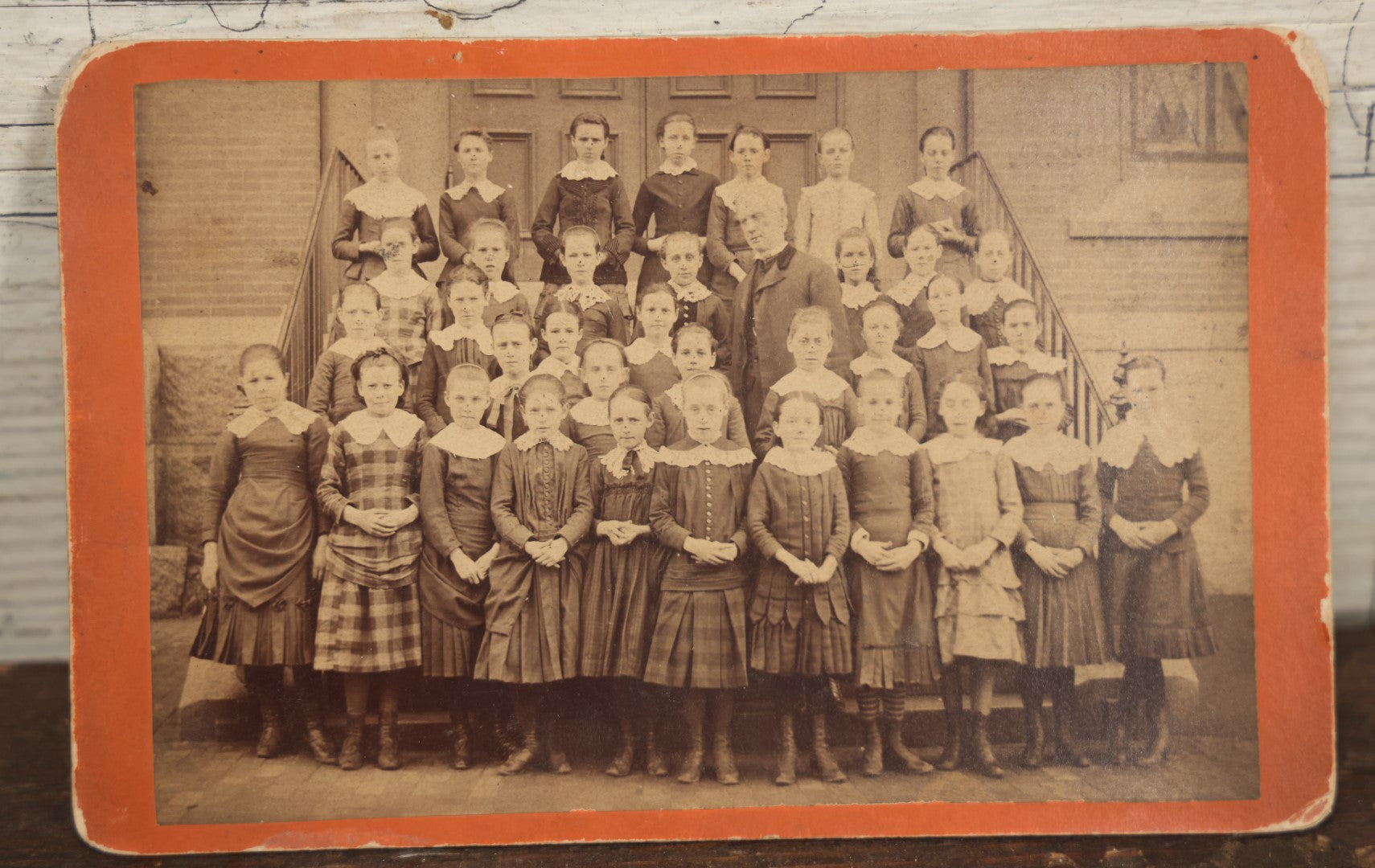 Lot 053 - Antique Cabinet Card Photograph Of An All Girls School Class, Outside Building, With Adult Man Teacher Or Headmaster, Writing On Back, Essex Street, Salem