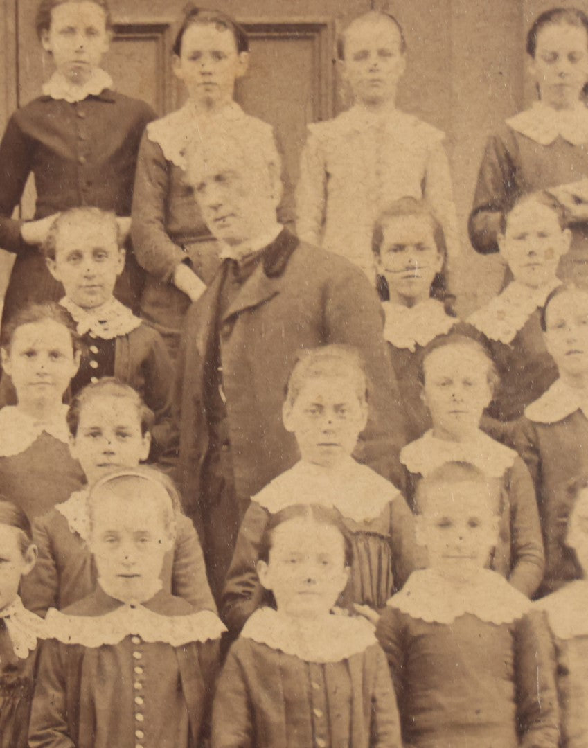 Lot 053 - Antique Cabinet Card Photograph Of An All Girls School Class, Outside Building, With Adult Man Teacher Or Headmaster, Writing On Back, Essex Street, Salem