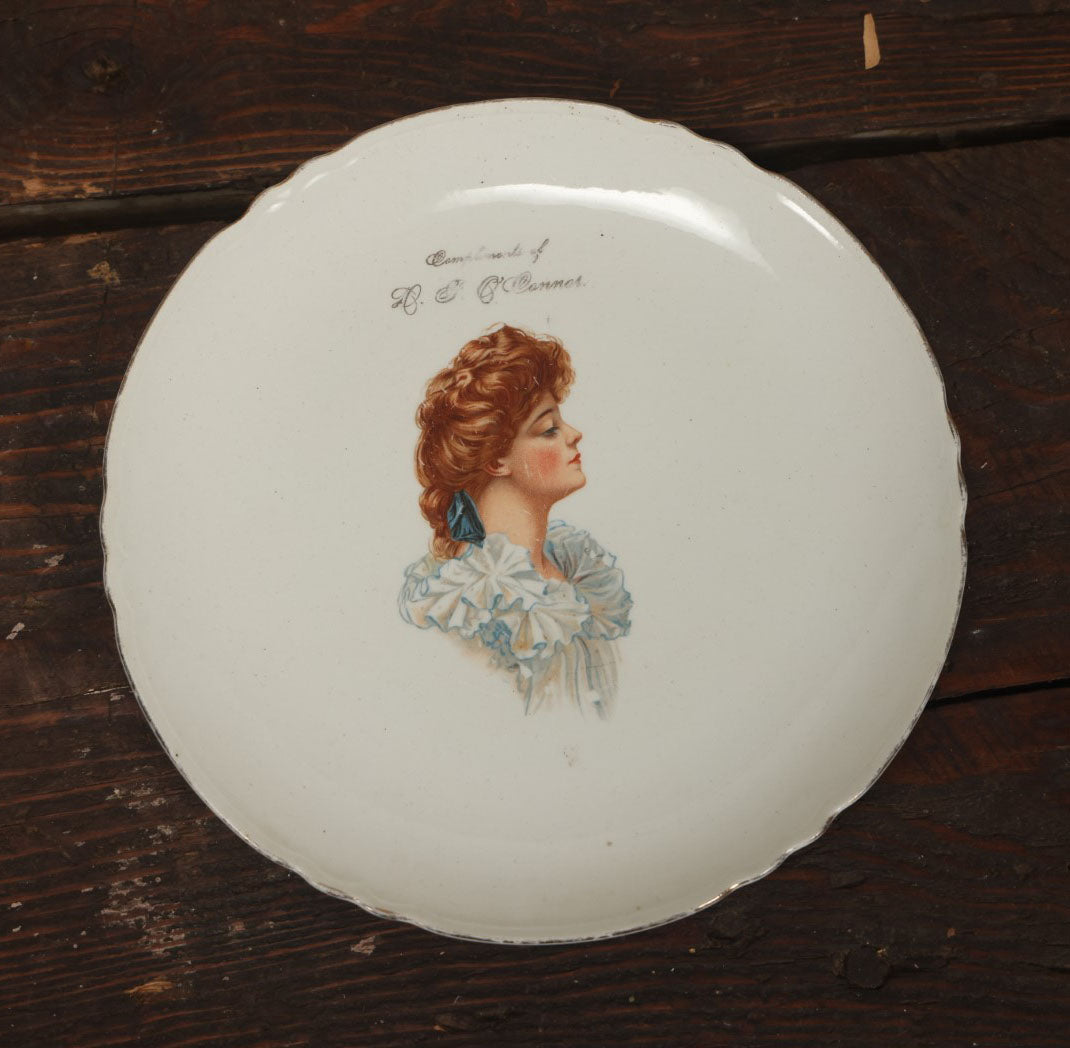 Lot 060 - Antique Porcelain Transferware Advertising Plate, Compliments Of D.F. O'Connor, With Woman In Profile, G.P. Co Globe China