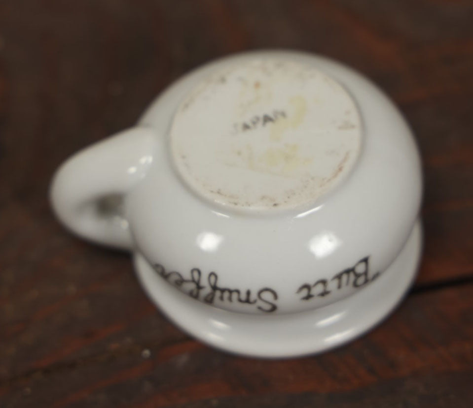 Lot 068 - Vintage Butt Snuffer Tea Cup Porcelain Novelty Ashtray, Made In Japan, With Upturned Butt In Cup