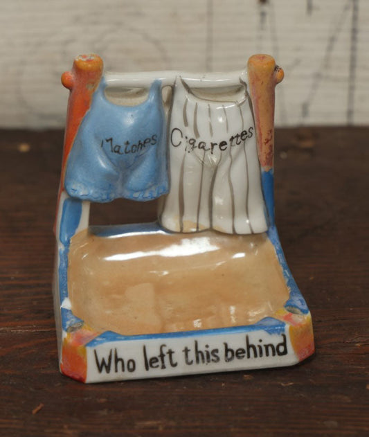 Lot 071 - Vintage "Who Left This Behind" Clothesline Porcelain Novelty Ashtray, Match Holder, And Match Strike, Made In Japan