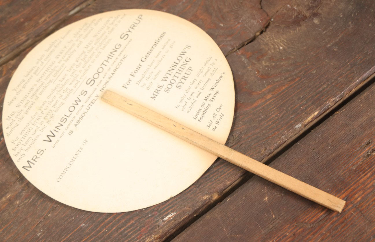 Lot 097 - Antique Paper Advertising Fan Compliments Of Mrs. Winslow's Soothing Syrup, With  Mother And Baby On Front, For Children Teething