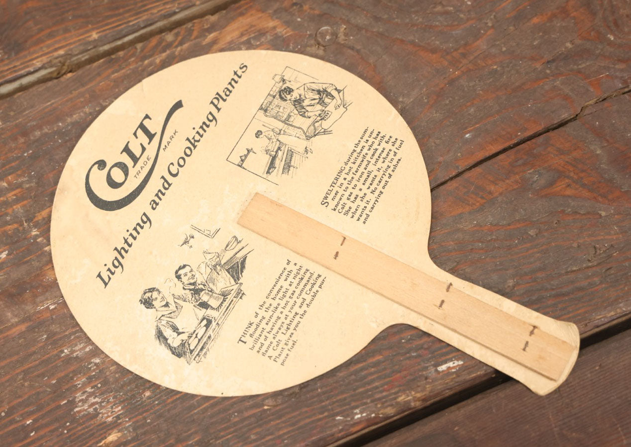 Lot 098 - Vintage Paper Advertising Fan For Colt Lighting And Cooking, Flashlight Graphic On Front