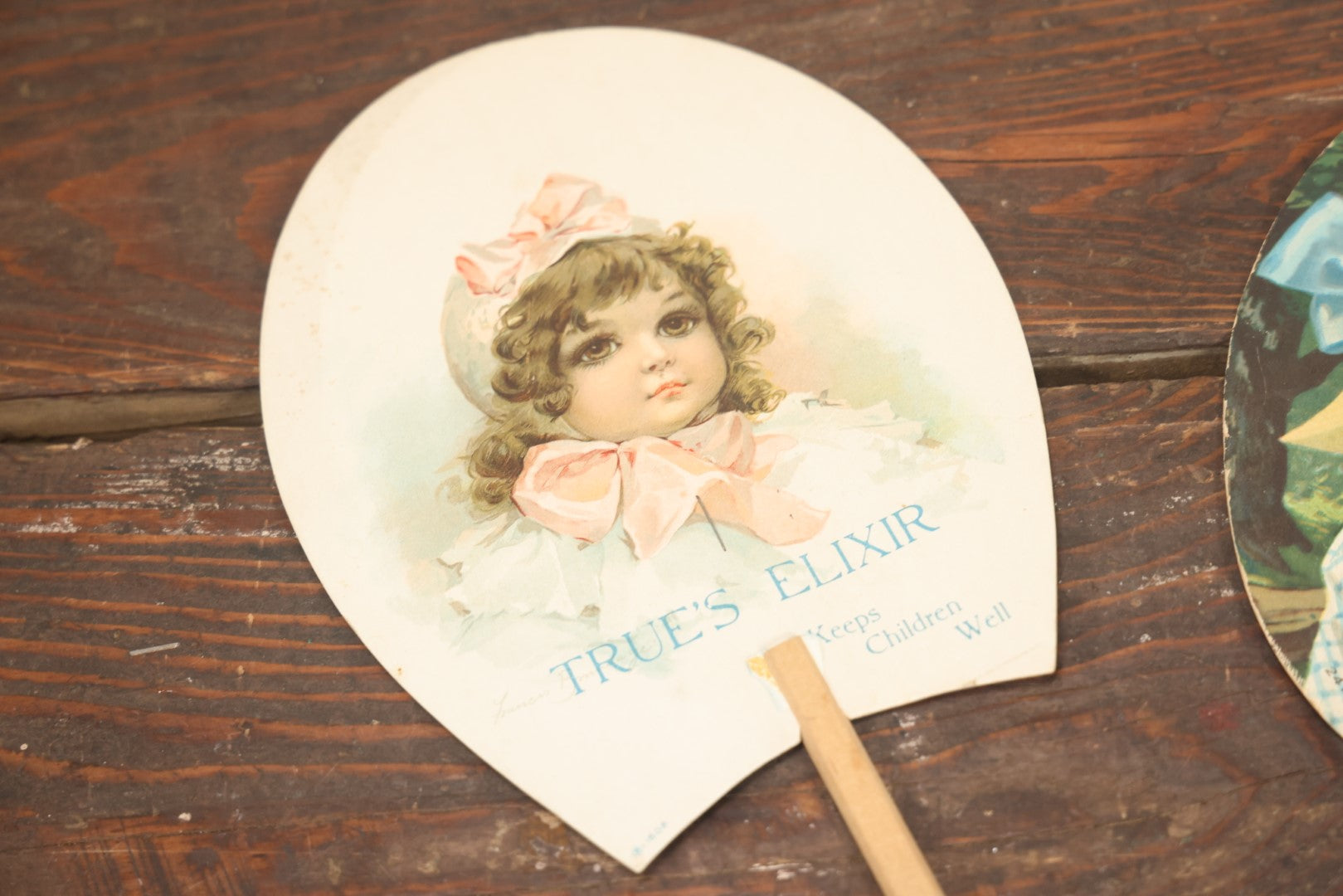 Lot 100 - Grouping Of Three Antique Paper Advertising Fans For True's Elixir, Meader's Flower Shop, And The Radcliffe Shoe