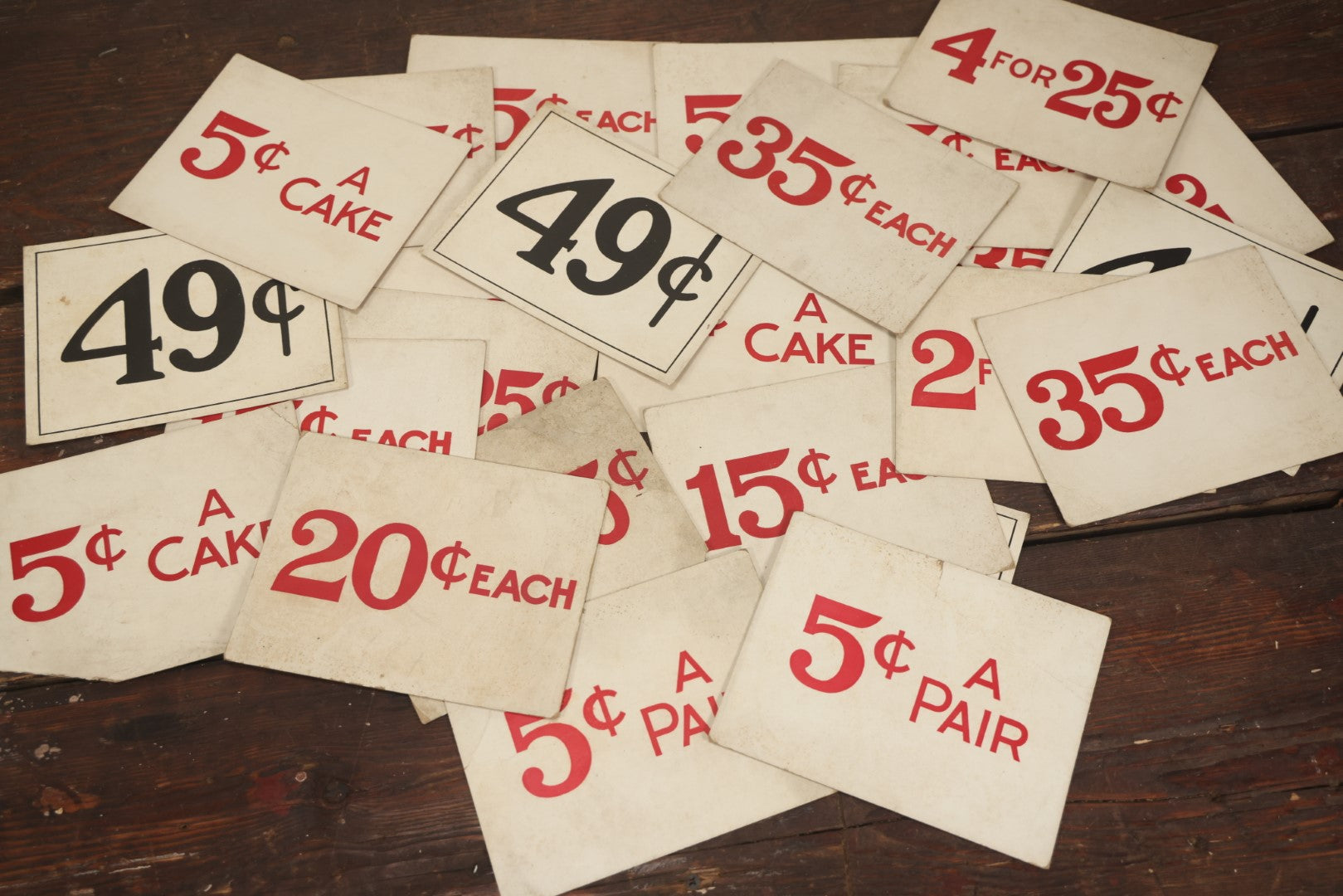 Lot 104 - Grouping Of 25 Larger Vintage Five And Dime Store Pricing Labels, 20C, 5C A Pair, 5C A Cake, And More, Approximately 7" x 5-1/2"