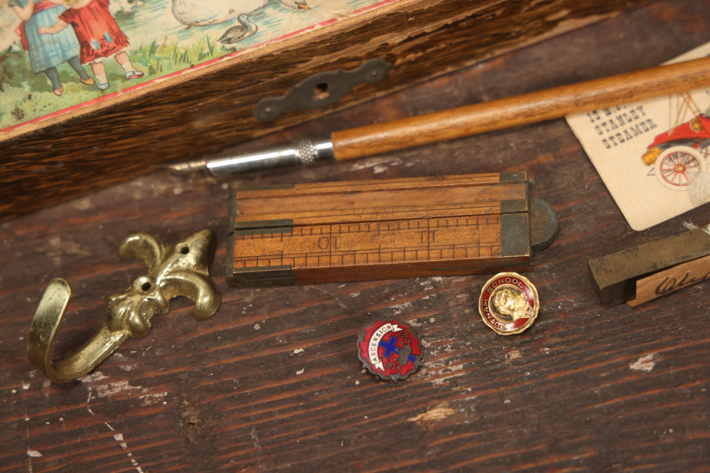 Lot 124 - Small Trinket Box Lot Grouping Including Antique Wood Pencil Box With Fairy Tale Scene, Fold Out Ruler, Wooden Pen, Pins, And More