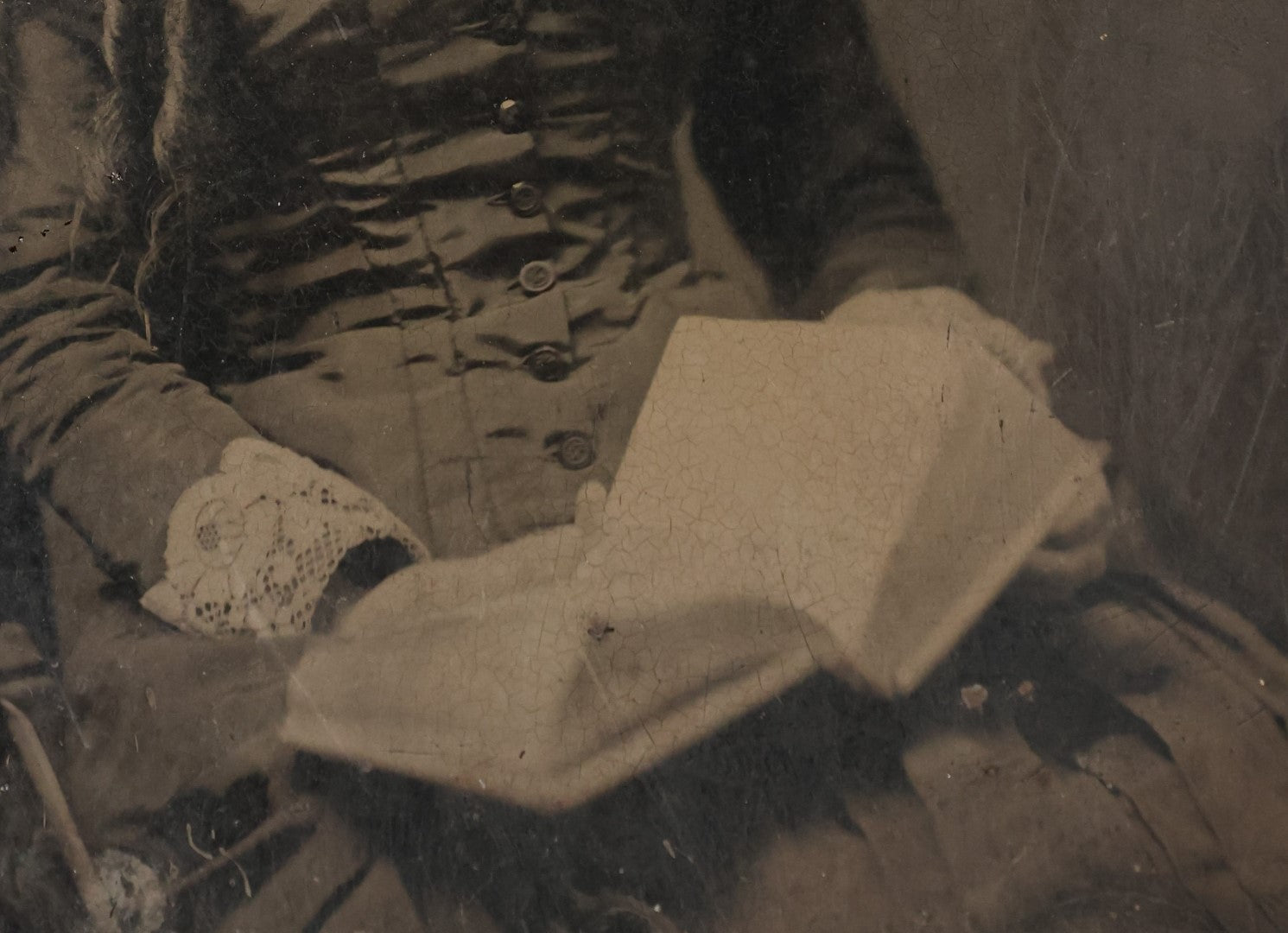 Lot 004 - Antique 1/2 Plate Tintype Photograph Of A Young Woman With An Open Book In Her Lap, Long Curls In Her Hair