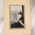 Lot 020 - Vintage Boarded Snapshot Photo Of A Wise Looking Dog Looking Out A Sunny Window, Paws On Window Sill