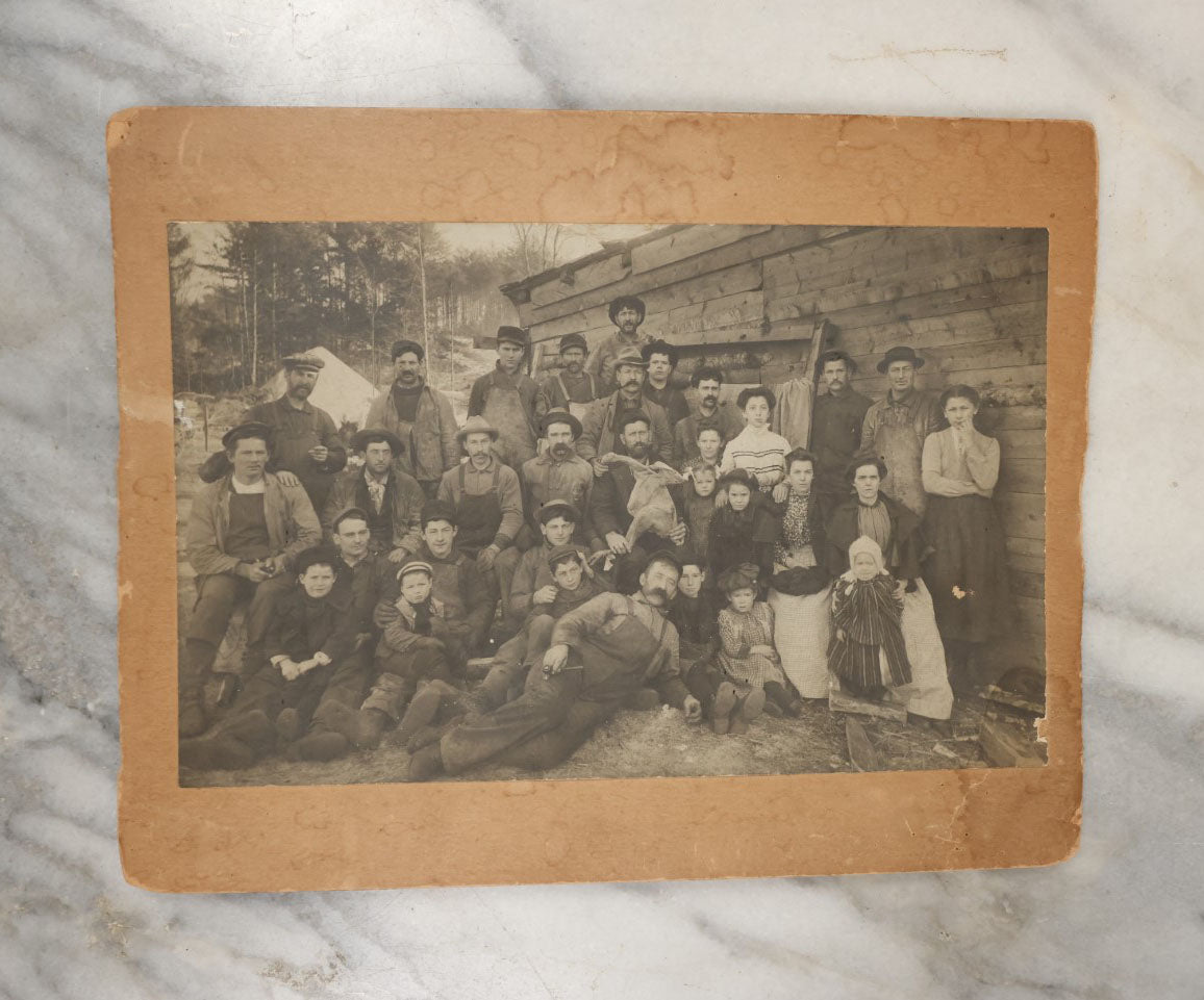 Lot 023 - Antique Boarded Occupational Photograph Of A Group Of Gruff Looking Laborers And Their Families, Likely On Thanksgiving, Note Men Displaying Turkey