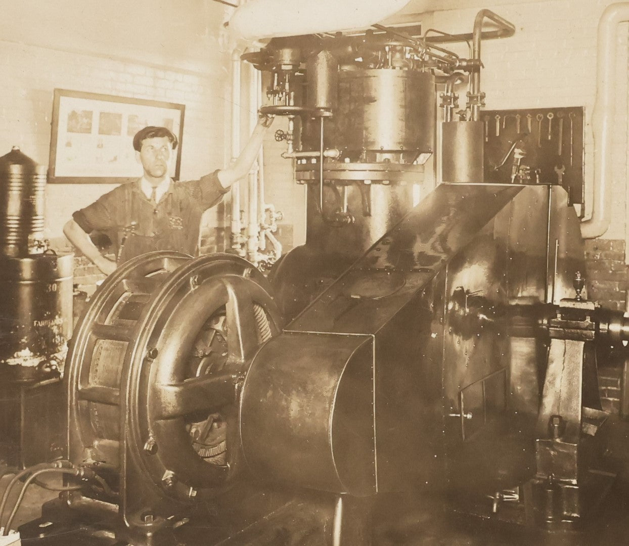 Lot 027 - Antique Boarded Occupational Photograph Of A Man With A Large Piece Of Machinery, Unknown Apparatus, Possible Generator