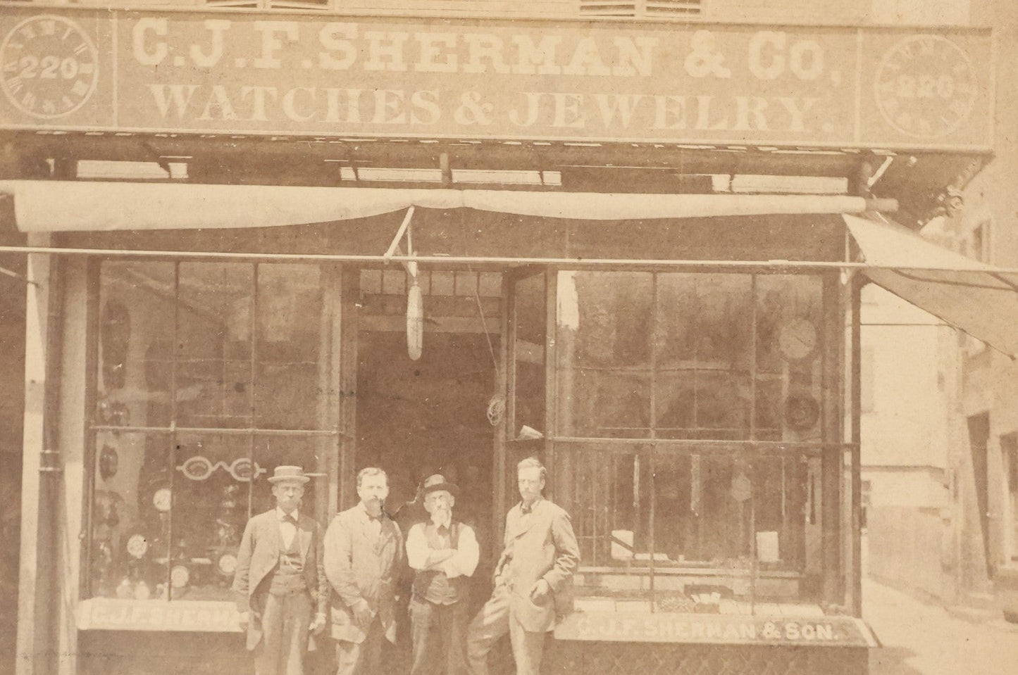 Lot 028 - Antique Cabinet Card Occupational Photograph Of C.J.F. Sherman & Co., Watches And Jewelry, With Men Outside, Note Optometrist Glasses Sign In Window, By Rand & Gould, Photographers, Boston
