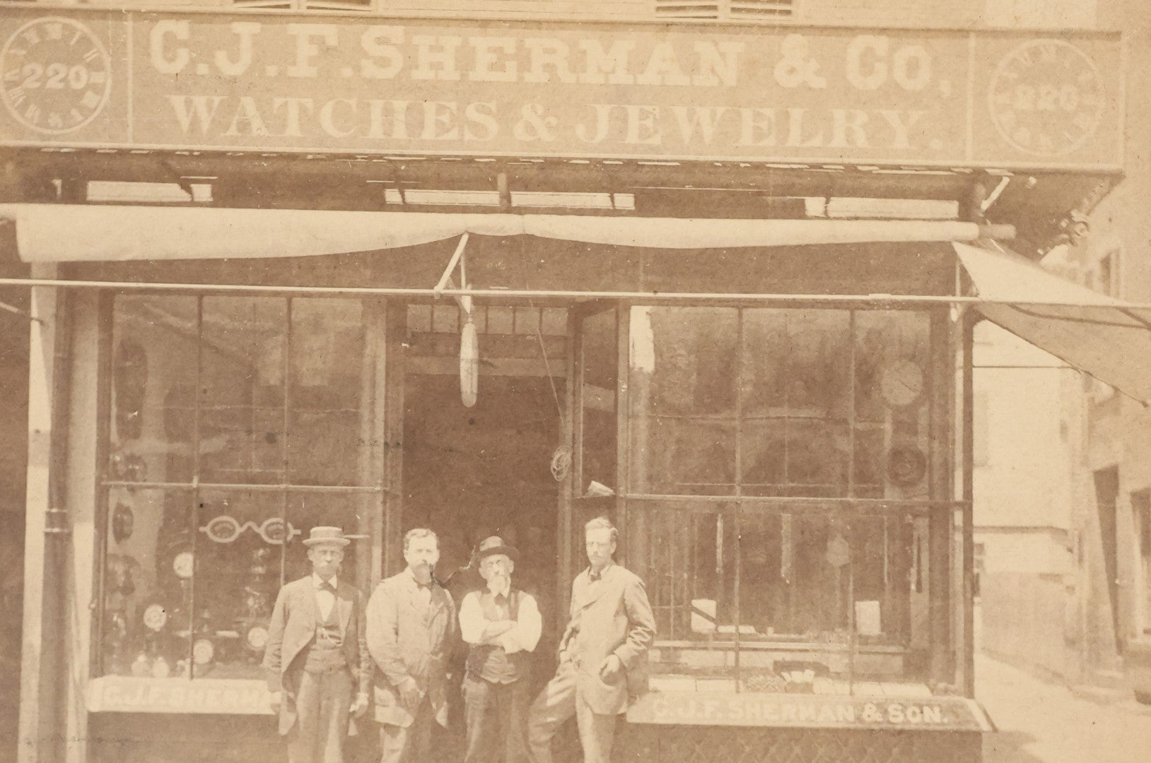 Lot 028 - Antique Cabinet Card Occupational Photograph Of C.J.F. Sherman & Co., Watches And Jewelry, With Men Outside, Note Optometrist Glasses Sign In Window, By Rand & Gould, Photographers, Boston