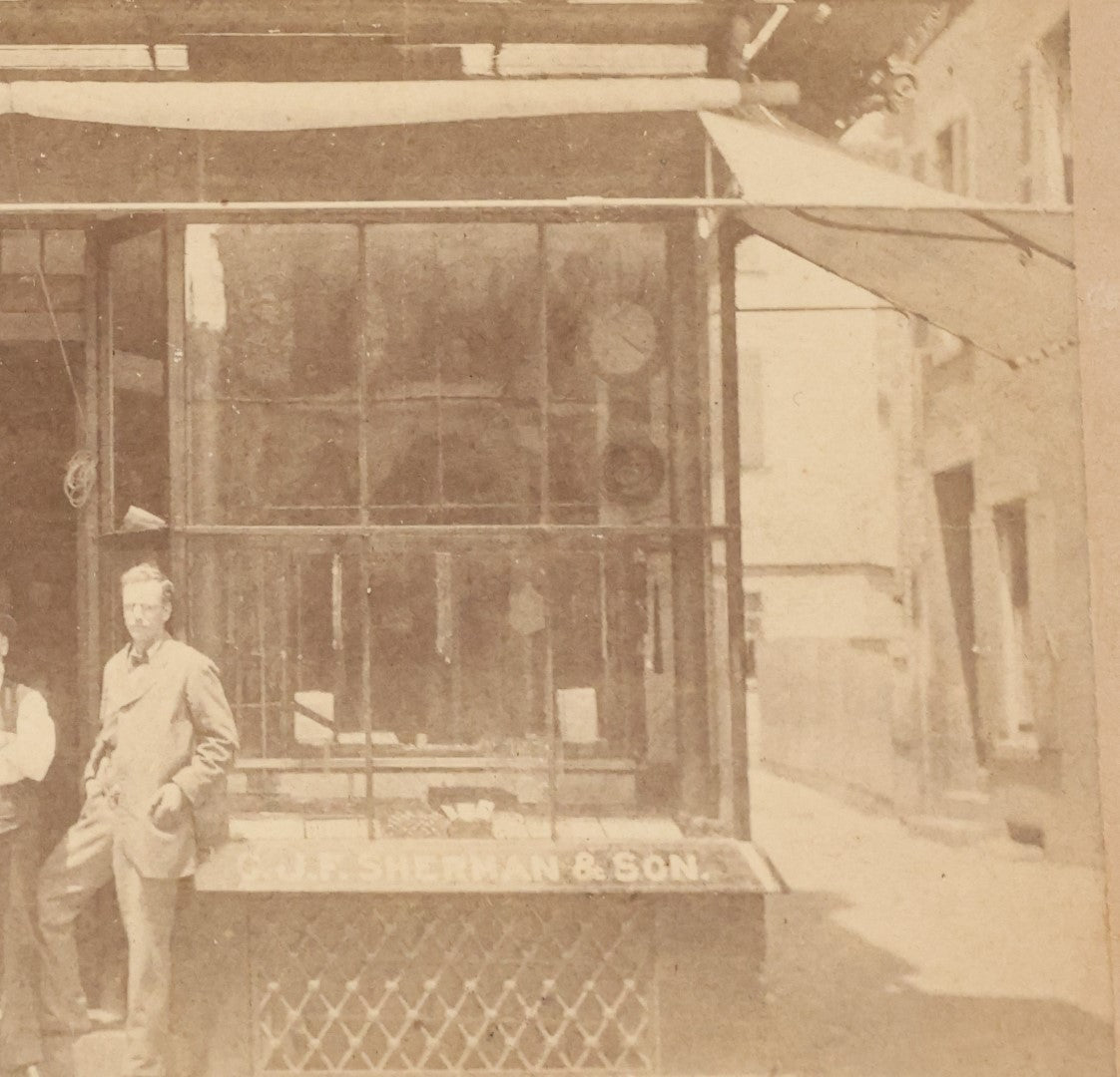 Lot 028 - Antique Cabinet Card Occupational Photograph Of C.J.F. Sherman & Co., Watches And Jewelry, With Men Outside, Note Optometrist Glasses Sign In Window, By Rand & Gould, Photographers, Boston
