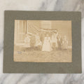 Lot 030 - Antique Boarded Photograph Of A Woman And Children In Front Of As 48 Star American Flag, Early 20th Century, Little Girl Identified As Teresa Heyes