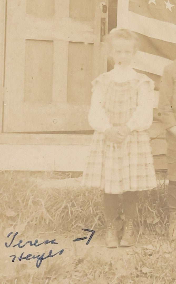 Lot 030 - Antique Boarded Photograph Of A Woman And Children In Front Of As 48 Star American Flag, Early 20th Century, Little Girl Identified As Teresa Heyes