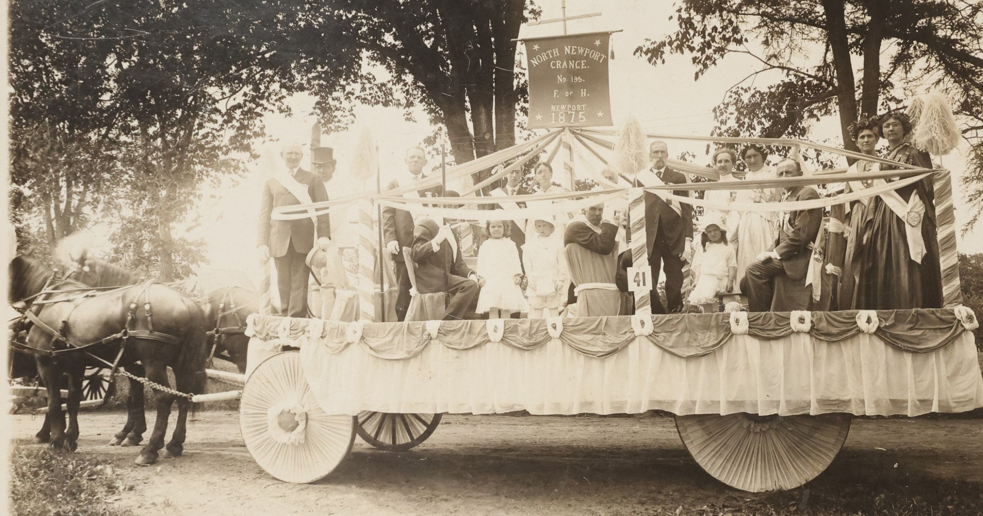 Lot 031 - Antique Boarded Photograph Of A Parade Float, North Newport Grange, Newport Maine Centennial Parade, 1914, By Novelty Photo, F. Hayes Photographer, Beverly, Massachusetts