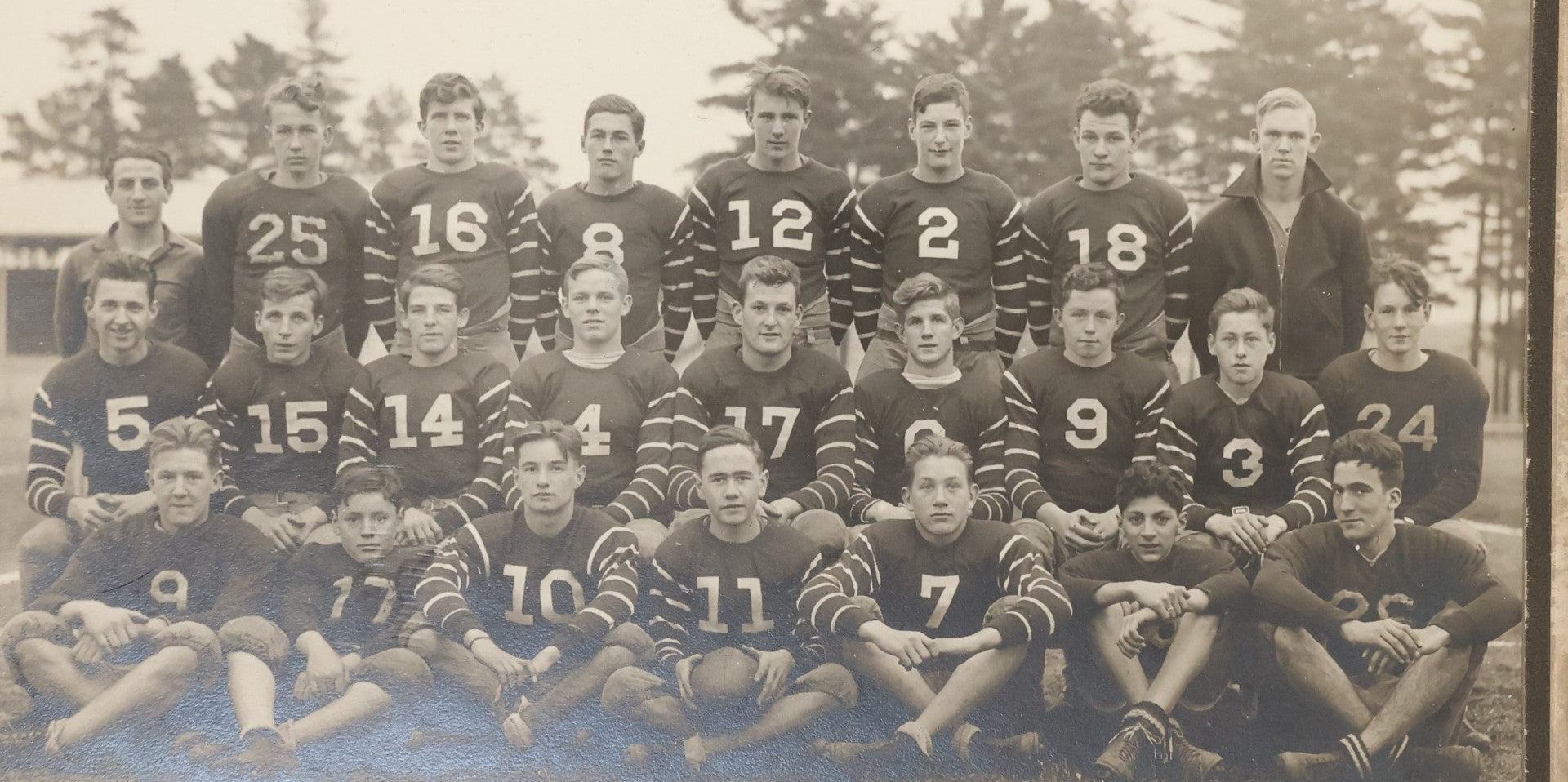 Lot 034 - Vintage Boared Photograph Of An High School Boys American Football Team, In Numbered Uniforms, No Location Given, Young Coach In Photo