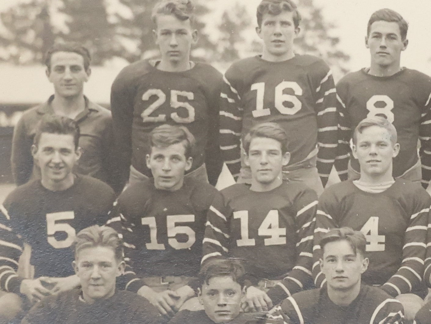 Lot 034 - Vintage Boared Photograph Of An High School Boys American Football Team, In Numbered Uniforms, No Location Given, Young Coach In Photo