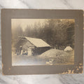 Lot 037 - Antique Boarded Photograph Of The Homestead Of Andrew Young, Kalispell, Montana, With Root Cellar And Chicken Tent, Dog In Photo, Dated September 12, 1897