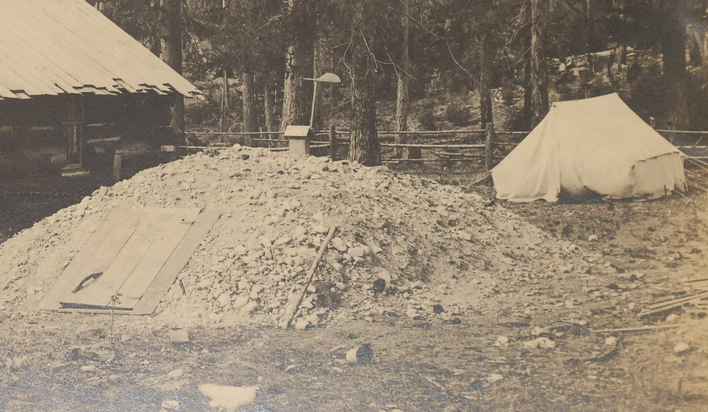 Lot 037 - Antique Boarded Photograph Of The Homestead Of Andrew Young, Kalispell, Montana, With Root Cellar And Chicken Tent, Dog In Photo, Dated September 12, 1897