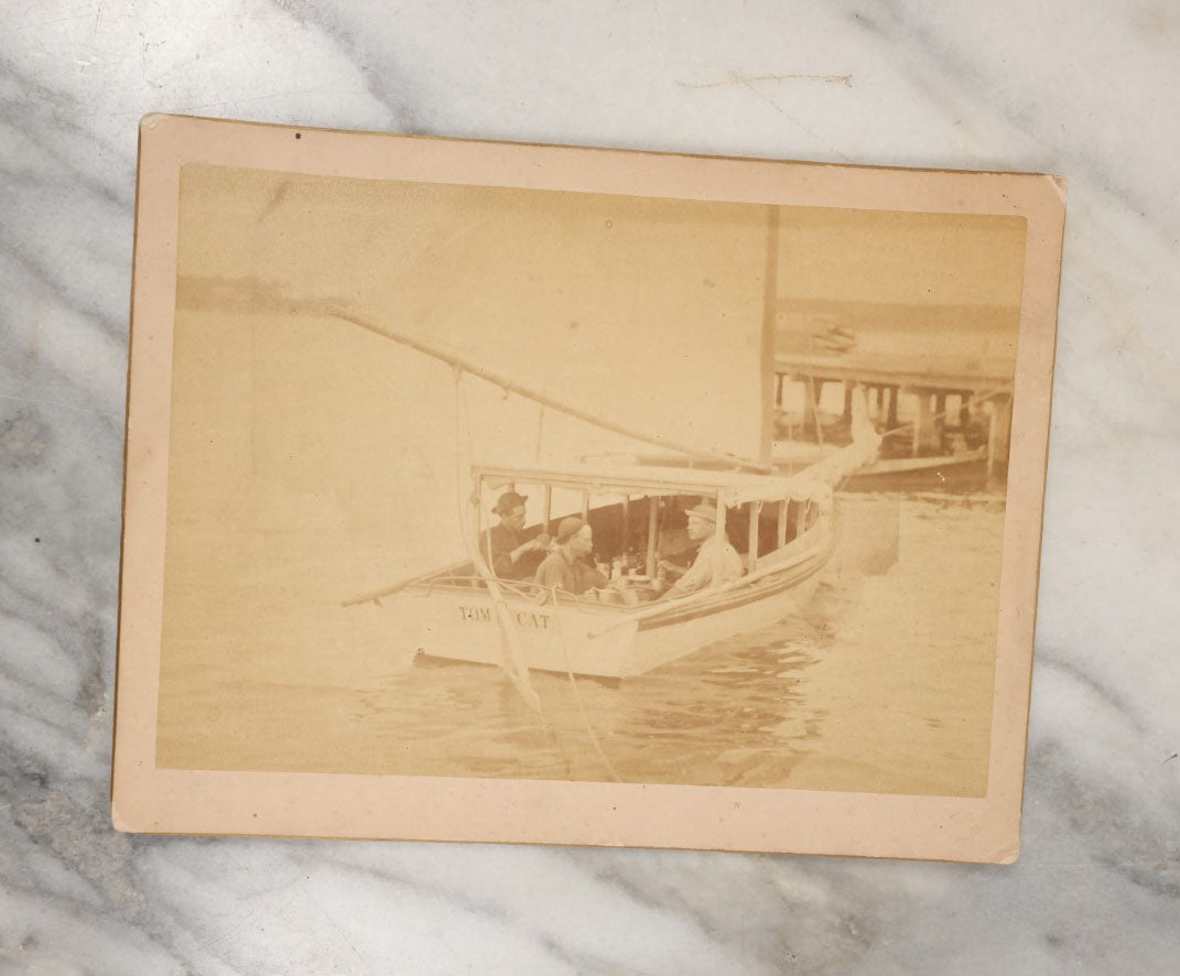 Lot 040 - Grouping Of Three Antique Boarded Photos Of Maritime Scenes, Including "Tom Cat" Boat, The U.S.S. Hartford, Circa 1875, Gloucester, Massachusetts, And A Dock / Pier