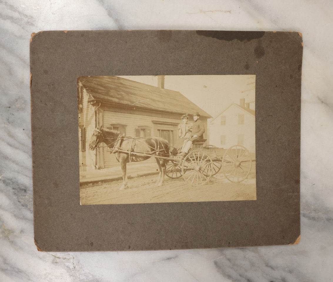 Lot 042 - Grouping Of Five Antique Boarded Photos Of People And Their Horses, Including Man And Woman In Carriage, Man With White Horse, And Horses Loading Rail Cars