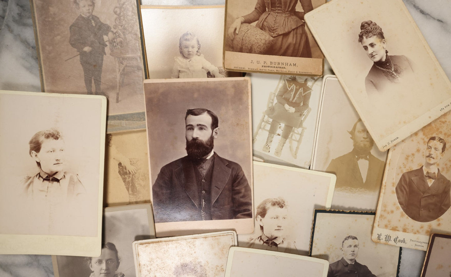 Lot 043 - Grouping Of 15+ Antique Cabinet Card Portrait Photographs Of Men, Women, And Children, Including Strikingly Handsome Man With Dark Beard, And Others, Photographers From Boston, New Hampshire, Etc. 