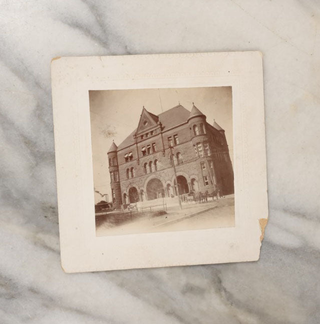 Lot 044 - Grouping Of Eight Photographs Of The Exteriors Of Buildings And Homes, Municipal Buildings And More, Including Mountain Home Of Joshua Edwards, Kalispell, Montana, 1897