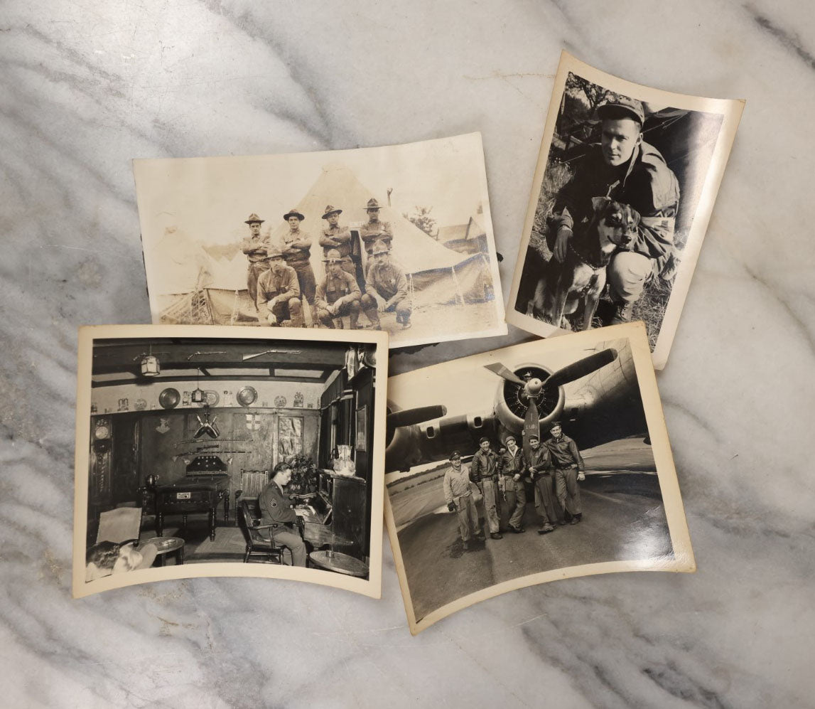 Lot 048 - Grouping Of Four Vintage Snapshot Photographs Of Soldiers, Including Airmen In Front Of Plane, Soldier With Dog, Man Working Communications, And More