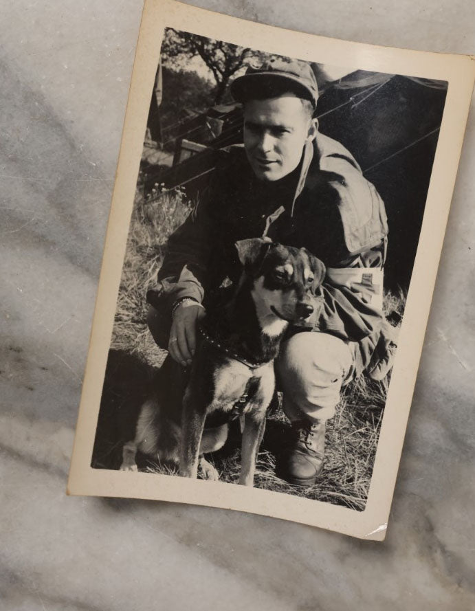 Lot 048 - Grouping Of Four Vintage Snapshot Photographs Of Soldiers, Including Airmen In Front Of Plane, Soldier With Dog, Man Working Communications, And More