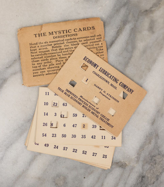 Lot 053 - The Mystic Cards, Vintage Advertising Magic Card Trick, Advertising Economy Lubricating Company, Charlestown, Massachusetts, With Instructions And Folder