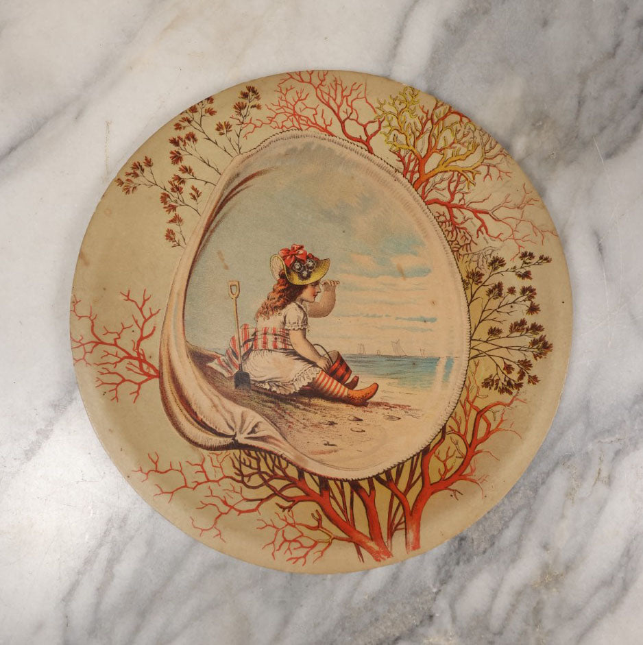 Lot 070 - Antique Wall Hanging Lithographed Decor, Little Girl On Beach In Seashell, Manufactured By Donaldson Brothers, Five Points, New York